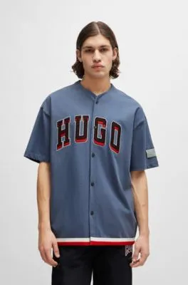Camiseta de baloncesto oversize fit con detalle de la marca de estilo universitario