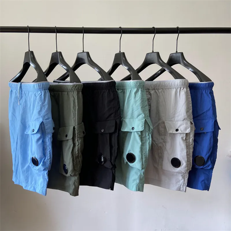 Summer Hombres cortos de bolsillo de bolsillo pantalones cortos de natación de nailon