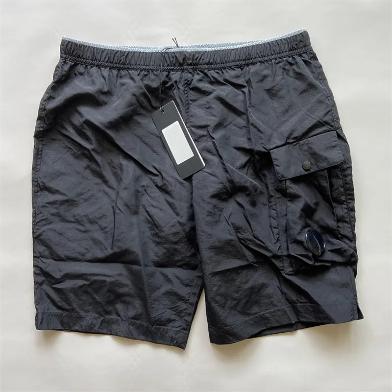 Summer Hombres cortos de bolsillo de bolsillo pantalones cortos de natación de nailon