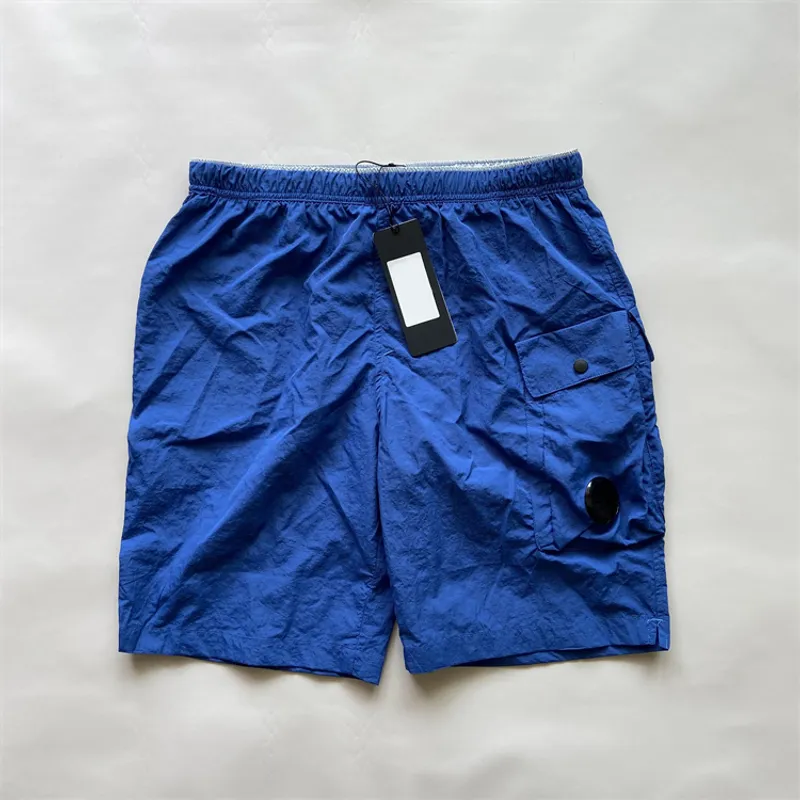 Summer Hombres cortos de bolsillo de bolsillo pantalones cortos de natación de nailon