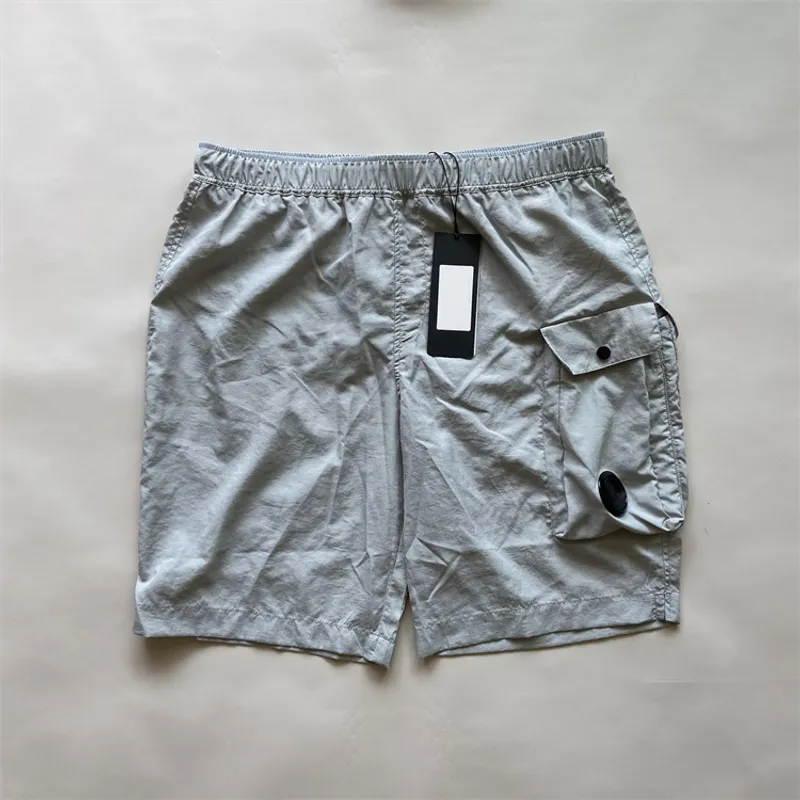 Summer Hombres cortos de bolsillo de bolsillo pantalones cortos de natación de nailon