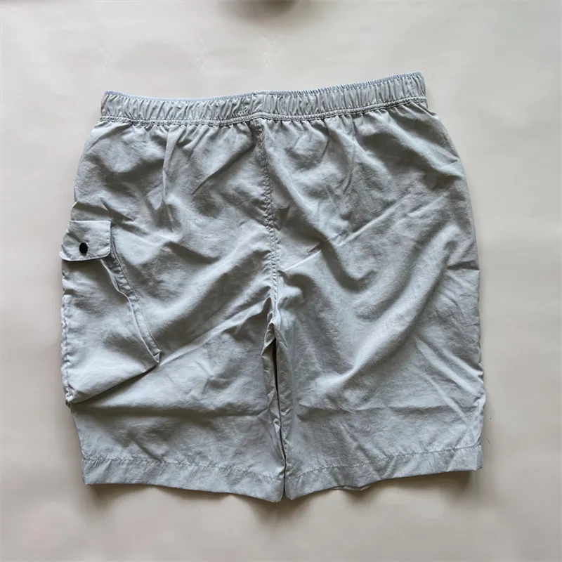 Summer Hombres cortos de bolsillo de bolsillo pantalones cortos de natación de nailon