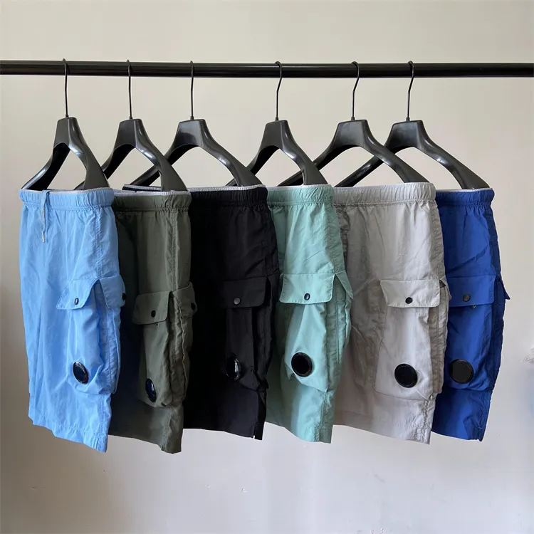 Summer Hombres cortos de bolsillo de bolsillo pantalones cortos de natación de nailon